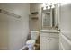 Small bathroom with white vanity and tile floor at 28548 N 68Th Ave, Peoria, AZ 85383