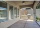 Covered patio with built-in grill and ceiling fan at 28548 N 68Th Ave, Peoria, AZ 85383