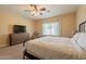 Bedroom with metal bed frame and carpet flooring at 2925 E Tonto Dr, Gilbert, AZ 85298