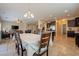 Open dining area with a view of the living room and kitchen at 2925 E Tonto Dr, Gilbert, AZ 85298