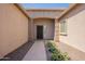 Front entry with decorative walkway and dark metal door at 2925 E Tonto Dr, Gilbert, AZ 85298