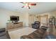 Bright and airy living room with a view into the entryway and hallway at 2925 E Tonto Dr, Gilbert, AZ 85298