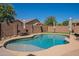 Stunning kidney shaped pool with ample space for lounging at 2925 E Tonto Dr, Gilbert, AZ 85298