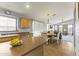 Kitchen with breakfast bar, stainless steel appliances, and view to Gathering room at 29875 N Sedona Pl, San Tan Valley, AZ 85143