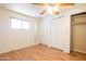 Bright bedroom with ample closet space and wood flooring at 345 S 58Th St # 27, Mesa, AZ 85206