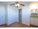 Bedroom with double closets and ceiling fan at 345 S 58Th St # 27, Mesa, AZ 85206