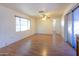 Bright living room featuring wood flooring and access to patio at 345 S 58Th St # 27, Mesa, AZ 85206