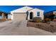 Charming single story home with neutral color and landscaping at 35170 W La Paz St, Maricopa, AZ 85138