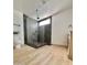 Modern bathroom with walk-in shower and grey tile at 4032 N 11Th Ave, Phoenix, AZ 85013