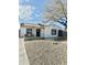 Charming single-story home with a modern pergola and black trim windows at 4032 N 11Th Ave, Phoenix, AZ 85013