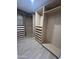 Large walk-in closet with ample shelving and drawers at 4032 N 11Th Ave, Phoenix, AZ 85013