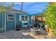 Cozy patio area with fire pit and seating for relaxing at 4048 W Sierra Vista Dr, Phoenix, AZ 85019