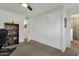 Bedroom with built-in shelving, large closet, and access to a bathroom at 4048 W Sierra Vista Dr, Phoenix, AZ 85019