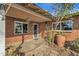 Front entry of brick home with covered porch at 4048 W Sierra Vista Dr, Phoenix, AZ 85019