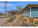 Brick home with teal accents and stone pathway at 4048 W Sierra Vista Dr, Phoenix, AZ 85019