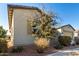 Side view of single-story home with desert landscaping at 42085 W Morning Glory Way, Maricopa, AZ 85138