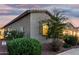 Well maintained side yard featuring greenery and rock landscaping at 42085 W Morning Glory Way, Maricopa, AZ 85138