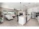 Modern kitchen with granite countertops and island at 42085 W Morning Glory Way, Maricopa, AZ 85138