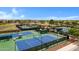 A view of well-maintained tennis courts within the community, offering a great space for recreational play at 42085 W Morning Glory Way, Maricopa, AZ 85138