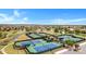 A sunny view of the community's multiple tennis courts, perfect for active residents and sports enthusiasts at 42085 W Morning Glory Way, Maricopa, AZ 85138