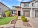 Two-story house with stone accents and a landscaped front yard at 44622 N Sonoran Arroyo Ln, New River, AZ 85087