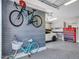 Garage with bike storage and additional shelving at 44622 N Sonoran Arroyo Ln, New River, AZ 85087