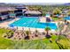 Community lap pool and recreation center with surrounding landscaping at 44622 N Sonoran Arroyo Ln, New River, AZ 85087