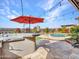 Stunning pool and spa with outdoor kitchen and bar at 44622 N Sonoran Arroyo Ln, New River, AZ 85087