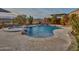 Relaxing pool and spa with a waterfall, perfect for outdoor entertaining at 44622 N Sonoran Arroyo Ln, New River, AZ 85087