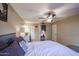 Serene bedroom with a ceiling fan and calming atmosphere at 4539 W Mclellan Rd, Glendale, AZ 85301