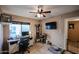 Versatile bedroom/office with workspace and pet area at 4539 W Mclellan Rd, Glendale, AZ 85301