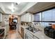 Modern kitchen featuring stainless steel appliances and white cabinets at 4539 W Mclellan Rd, Glendale, AZ 85301