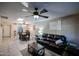 Living room with leather sofa and coffee table at 4539 W Mclellan Rd, Glendale, AZ 85301