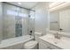 Updated bathroom with a bathtub, vanity, and mosaic tile accents at 4565 N 26Th Dr, Phoenix, AZ 85017