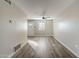 Living room with laminate flooring, neutral walls, and a ceiling fan at 4565 N 26Th Dr, Phoenix, AZ 85017