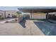 Covered carport parking space with additional storage at 4565 N 26Th Dr, Phoenix, AZ 85017