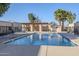 Community pool with covered seating and lounge chairs at 4565 N 26Th Dr, Phoenix, AZ 85017