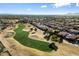 Aerial view showing the community, golf course and neighborhood at 4655 E Indigo St, Gilbert, AZ 85298