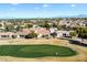 Aerial view of golf course and surrounding neighborhood at 4655 E Indigo St, Gilbert, AZ 85298