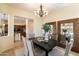 Formal dining room with chandelier and kitchen view at 4655 E Indigo St, Gilbert, AZ 85298