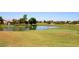 Pond and putting green on a golf course at 4655 E Indigo St, Gilbert, AZ 85298