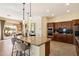 Island kitchen with granite counters and stainless steel appliances at 4655 E Indigo St, Gilbert, AZ 85298