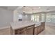 Spacious kitchen with farmhouse sink and large island at 4818 E Dartmouth Cir, Mesa, AZ 85205