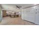 Modern kitchen with island, stainless steel appliances, and herringbone floors at 4818 E Dartmouth Cir, Mesa, AZ 85205