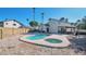 Inviting backyard oasis featuring a sparkling pool and spa at 4818 E Dartmouth Cir, Mesa, AZ 85205