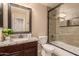 Bathroom with granite vanity, frameless shower, and tile flooring at 494 S 220Th Ln, Buckeye, AZ 85326