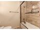 Bathroom with shower/tub combo and tile surround at 494 S 220Th Ln, Buckeye, AZ 85326