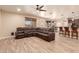 Open concept living room with a view into the kitchen area at 494 S 220Th Ln, Buckeye, AZ 85326