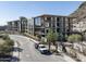 Modern building exterior with large windows and mountain views at 5000 N Camelback Ridge Dr # 301, Scottsdale, AZ 85251