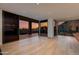 Living room with an adjacent balcony featuring mountain and city views at 5000 N Camelback Ridge Dr # 301, Scottsdale, AZ 85251